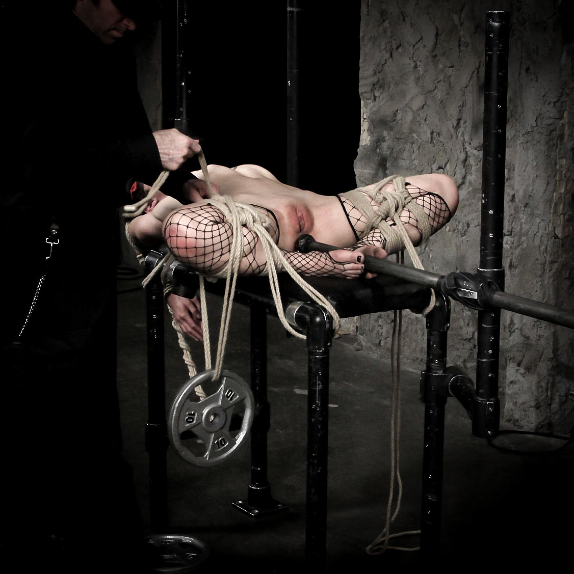 Mei Mara, nude, bound and tormented in a BDSM video at Society SM.