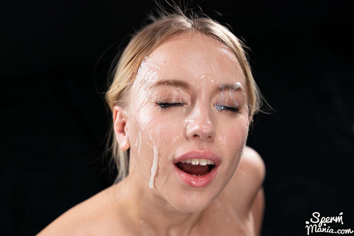 Kira Thorn's Sticky Bukkake Facial. A nude girl covered in cum in an uncensored SpermMania video.